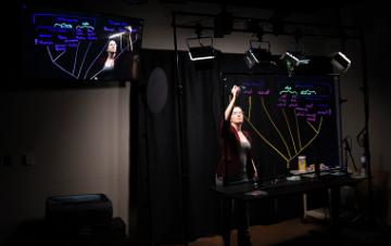 Tanya Chiykowski-Rathke working in the Learning Glass studio in the University Library. 