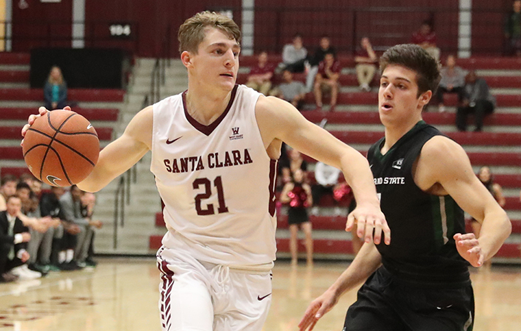 Henry Caruso 18 drives to the basket image link to story